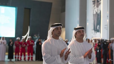 Sheikh Mansour bin Zayed and HH Sheikh Hazza bin Zayed applaud a presentation during the official opening of the Abu Dhabi National Oil Company Headquarters. Mohamed Al Hammadi / Crown Prince Court — Abu Dhabi