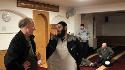 Visitors speak with French Muslims at a mosque on the French Mediterranean island of Corsica (AFP / Pascal POCHARD-CASABIANCA)