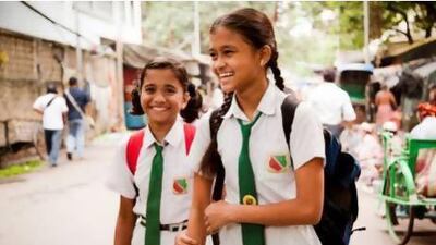 Girls walk to school in India. Courtesy 10x10act.org