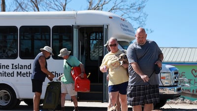 Pine Island residents and their dogs. Getty / AFP
