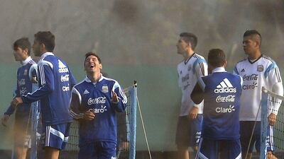 Lionel Messi shown laughing during an Argentina training session on Tuesday in Buenos Aires. Gustavo Amarelle / AFP / May 27, 2014