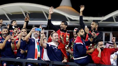 Bahrain National Team arrives to celebrate their victory at the the Gulf Cup, at Bahrain International Circuit in Sakhir, Bahrain. REUTERS