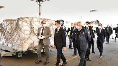 Omar Obaid Al Shamsi, UAE's ambassador in Rome, pictured centre in a black suit, is shown the medical equipment shipment before it is sent on to hospitals. Protective equipment is crucial to ensuring frontline medical workers do not become casualties. Courtesy: Ministry of Foreign Affairs and International Cooperation