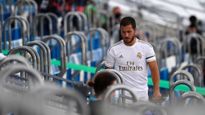 Real Madrid's Belgian forward Eden Hazard in the stands after leaving the pitch. AFP
