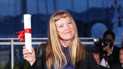 Director Andrea Arnold poses after being awarded the Jury Prize for the movie American Honey. Andreas Rentz / Getty Images)
