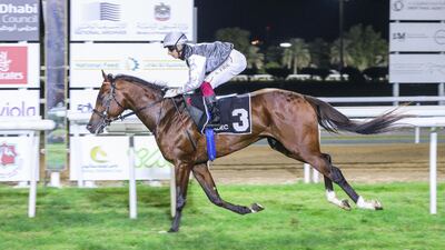 Bahar Muscat, ridden by Antonio Fresu, wins the Listed race at Abu Dhabi Equestrian Club. Shutterstock