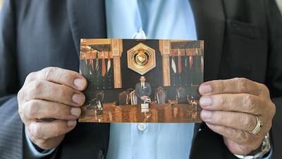 Marwan Naser shows a throwback image of himself from the 1986 GCC summit in the Dar El Istiqbal ballroom at the InterContinental hotel.