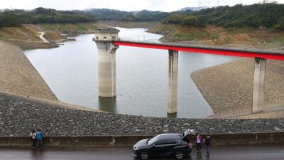 Tourists visit the Baoshan second reservoir amid low water levels during an island-wide drought, in Hsinchu, Taiwan. Reuters