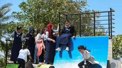 Students enjoy the slide at the Hay Festival.