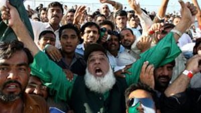 Chaudhry Abdul Jalil, centre, during the match between Pakistan and New Zealand at Zayed Cricket Stadium in Abu Dhabi last week.