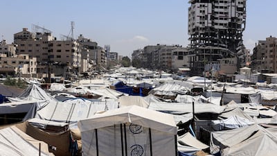 Tents sheltering displaced people in Gaza city. A high-ranking member of the Israeli military has been arrested and charged with smuggling into the territory. Reuters
