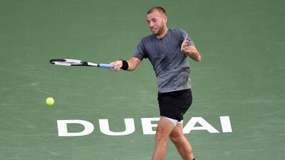 Dan Evans returns the ball. AFP