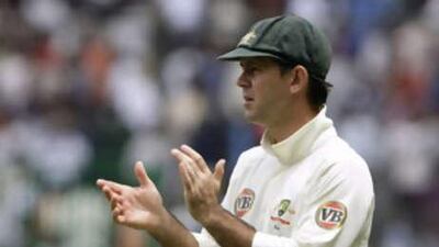 The Australian captain Ricky Ponting claps hands as his team returns for the tea break on the final day of their first cricket test against India in Bangalore, India.