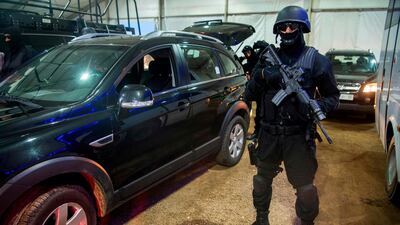 A member of the Moroccan Central Bureau of Judicial Investigation stands guard during an event, open to the public in Marrakech. AFP