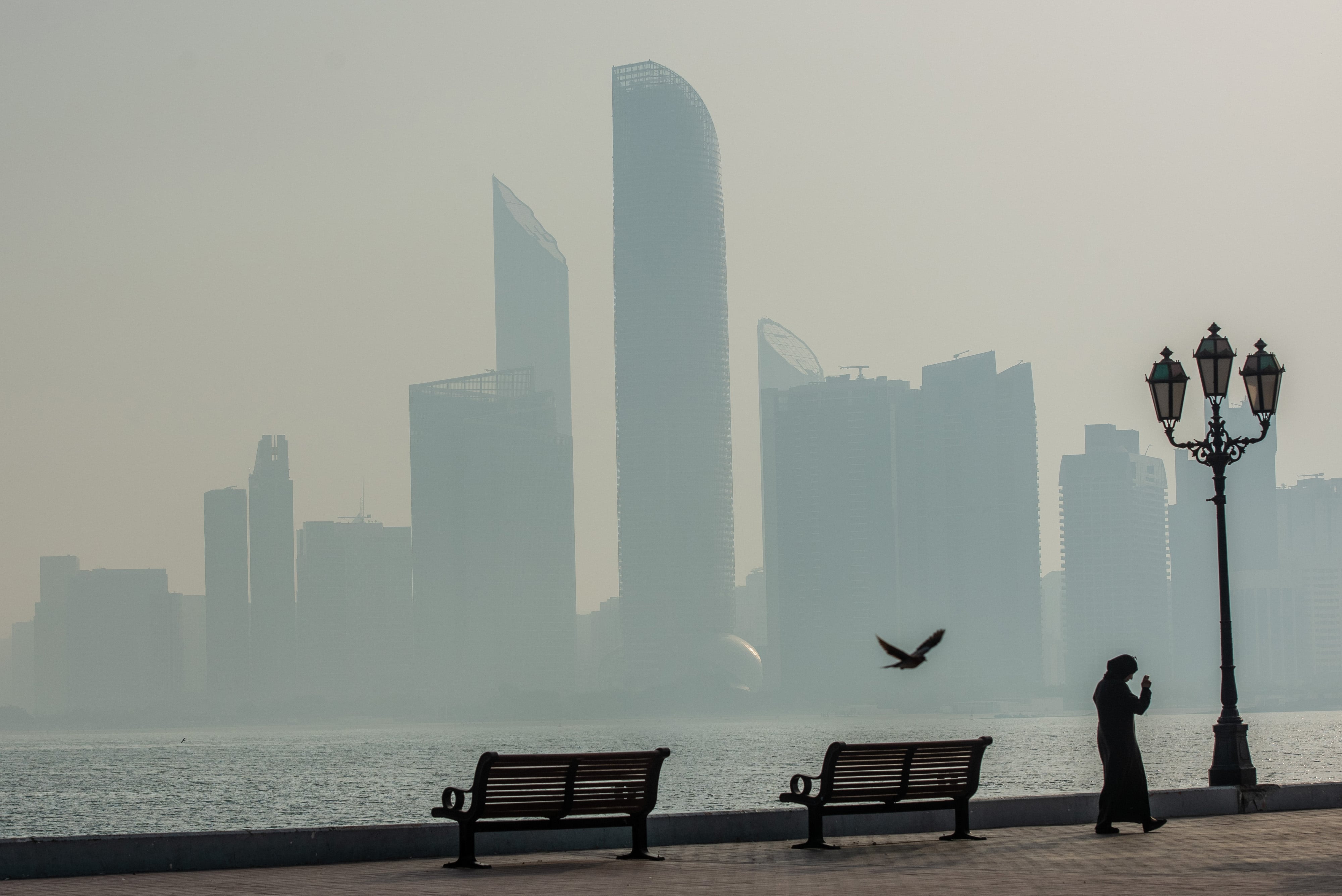 Commercial and residential buildings in Abu Dhabi. Gulf governments understand they must work from the bottom up rather than rely on fleeting relationships between observed economic growth rates and other macroeconomic variables. Bloomberg