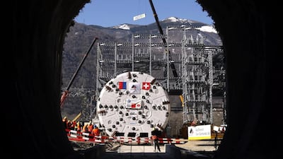 A drilling machine in front of the entrance of the Ceneri base tunnel in Sigirino, Switzerland, in 2008. With a length of 57 km crossing the Alps, the Gotthard Base Tunnel is the world’s longest railway tunnel. Karl Mathis / EPA