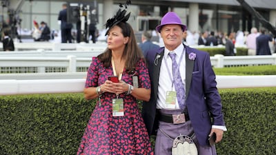 Regal colours are seen through outfits all over the racecourse. Chris Whiteoak / The National