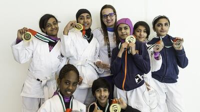 Gabriela Ponte, coach for Al Asaiel school with members of her team during the Abu Dhabi World Jiu-Jitsu Festival at Ipic arena in Abu Dhabi on April 10, 2017. Christopher Pike / The National