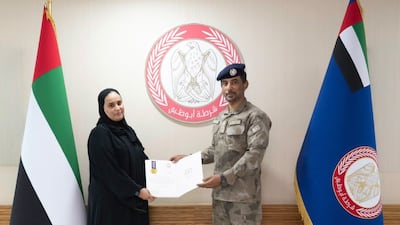 Yousra Qassem Ahmed Otli was honoured for her bravery by Abu Dhabi Police. Photo: Abu Dhabi Police