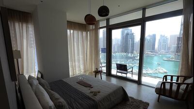 The three-tower development, which is located at the Media City end of Dubai Marina close to Cayan Tower and the Torch, is being completed in three stages with the 64-storey Tower Two due to be finished next year and the 53-storey, currently just a hole in the ground, expected to complete in 2019. Satish Kumar / The National