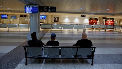 People wait at the almost empty arrival hall at Beirut airport during a strike in January 2019. Air-traffic controllers say they will work shorter hours on September 5 in protest against working conditions. AP Photo