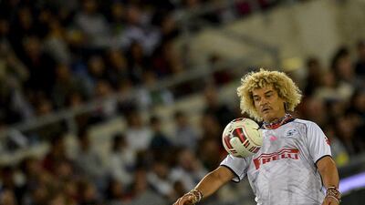 Columbian forward Carlos Valderrama controls the ball in the “Match For Peace” game on September 1, 2014 at Rome’s Olympic Stadium. Andreas Solaro / AFP