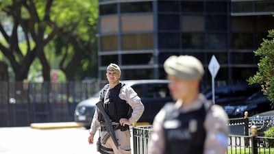 Members of Argentina's Naval Prefecture stand guard outside the Saudi Arabian embassy. Reuters