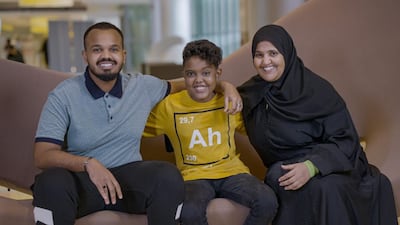 Montasir Elfatih Mohyeldin Taha, (C), with Khalifa, his brother, and his mother.