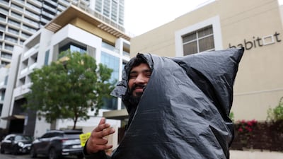 Heavy rain falls in Dubai on Monday, and more is expected in the days ahead. Chris Whiteoak / The National