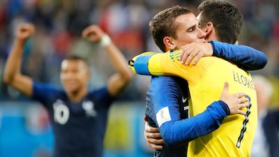 France's Antoine Griezmann and Hugo Lloris celebrate after winning the game 1-0. EPA