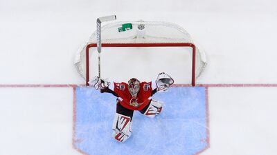 Ottawa Senators' goalie Craig Anderson celebrates the team's overtime win against the Montreal Canadiens during the overtime period of their NHL Eastern Conference quarterfinal hockey game in Ottawa May 7, 2013. REUTERS/Blair Gable (CANADA - Tags: SPORT ICE HOCKEY TPX IMAGES OF THE DAY)