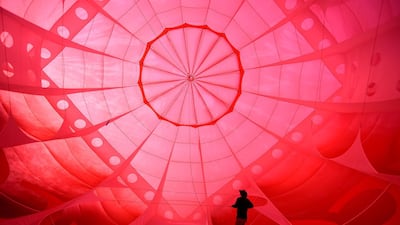 A balloon fills with hot air, ready to take off. Getty Images