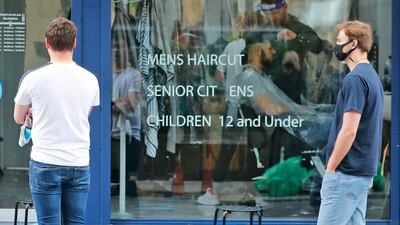 People in England can finally get a trim as the hairdressers reopen. AP