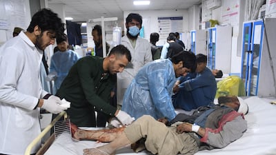 Injured people receive treatment at a hospital in Mazar-i-Sharif. EPA