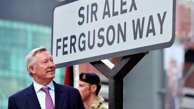 Alex Ferguson stands by his sign outside Old Trafford in October, 2013. Paul Ellis / AFP / October 14, 2013