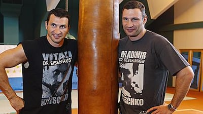 Brothers Wladimir Klitschko, left, and Vitali love each other so much that they even wear each other’s shirts. Alexander Hassenstein / Bongarts / Getty Images