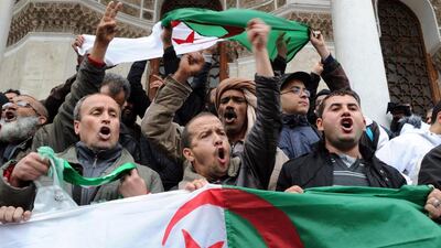 Family members of victims who disappeared during the war in Algeria in the 1990's wave their national flag and shout slogans as they take part in a demonstration on March 15 calling for justice and against ailing president Abdelaziz Bouteflika's decision to seek a fourth term in the next month's election. There is growing anger and derision in Algeria over Mr Bouteflika's intention to run due to his fragile health, with protests multiplying and many critics arguing that he is in no fit state to run the country. Farouk Batiche/AFP Photo