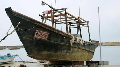 An unidentified wooden boat which was found in the sea off Noto Peninsula, is seen in Wajima, Japan. A number of boats containing dead bodies have been washed up on Japan's shores since October but authorities have not commented on their origins. Kyodo/Reuters
