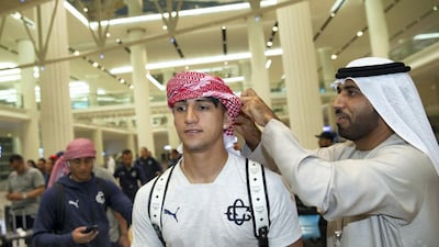 A Guadalajara player is greeted after arriving in Abu Dhabi for the Fifa Club World Cup. Courtesy Fifa Club World Cup UAE 2018