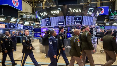 Members of the New York National Guard on the floor of the New York Stock Exchange. US stocks rose than 1 per cent in the first week of 2026. Bloomberg
