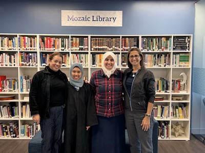 Raghad Bushnaq, second from right, at Mozaic's library. Mozaic