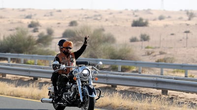 Gurnam Singh believes he can spread a message of peace and tolerance, and teach the new generation about Sikhism, through bike riding. Pawan Singh / The National