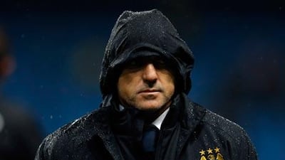 Manchester City and manager Roberto Mancini were knocked out the Capital One Cup.