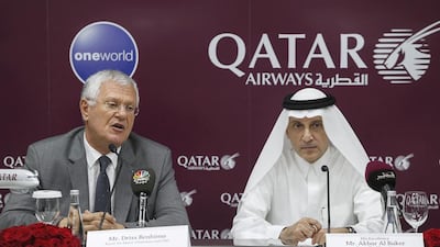 Qatar Airways chief executive Akbar Al Baker, right, with Royal Air Maroc chairman Driss Benhima during the announcement of the two carriers' commercial partnership at the Arabian Travel Market in Dubai. Antonie Robertson / The National