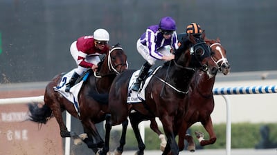 Ryan Moore rides Mendelssohn to victory in the UAE Derby. Christopher Pike / Reuters