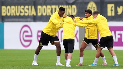 epa07847014 Dortmund players (L-R) Dan-Axel Zagadou, Raphael Guerreiro, Mahmoud Dahoud, and Thorgan Hazard attend their team's training session in Dortmund, Germany, 16 September 2019. Borussia Dortmund will face FC Barcelona in their UEFA Champions League group F soccer match on 17 September 2019. EPA/FRIEDEMANN VOGEL