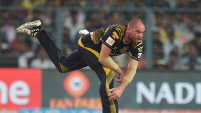 Kolkata Knight Riders cricketer John Hastings bowls during the 2016 Indian Premier League (IPL) Twenty20 cricket match between Kolkata Knight Riders and Delhi Daredevils at the Eden Gardens Cricket Stadium in Kolkata on April 10, 2016. AFP / Dibyangshu SARKAR