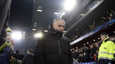 Jose Mourinho and Chelsea clinched passage into the Champions League knock-out round last night thanks to Schalke being held to a draw. Fabrice Coffrini / AFP