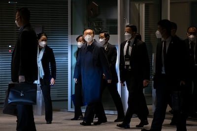 Senior Chinese foreign policy adviser Yang Jiechi and his delegation leave the Hyatt hotel at Zurich Airport, Switzerland, on October 6, 2021. AP