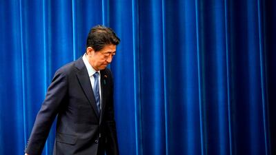Japanese Prime Minister Shinzo Abe walks out at the end of his press conference at the prime minister official residence in Tokyo on August 28 .Franck Robichon/ AFP/ Pool